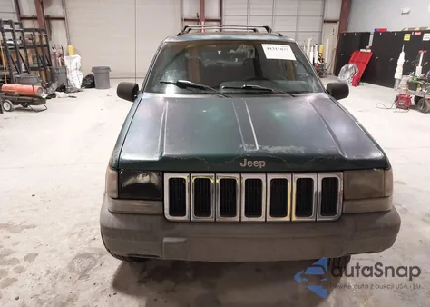 1997 Jeep Grand Cherokee Laredo/Tsi из США, поврежденный, VIN 1J4GZ58S9VC575673